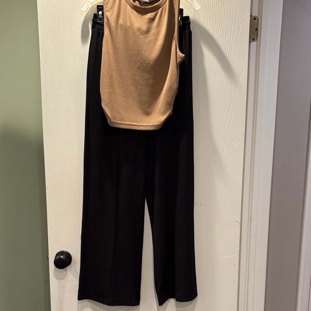 Black Wide-Leg Pants and camel mock neck tank.